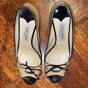 Jimmy Choo Black and Tan pumps